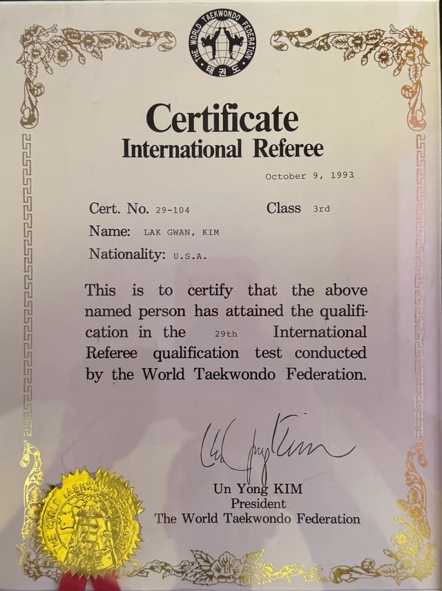 Original English World Taekwondo Federation International Referee certificate for Lak Gwan Kim, dated October 9, 1993