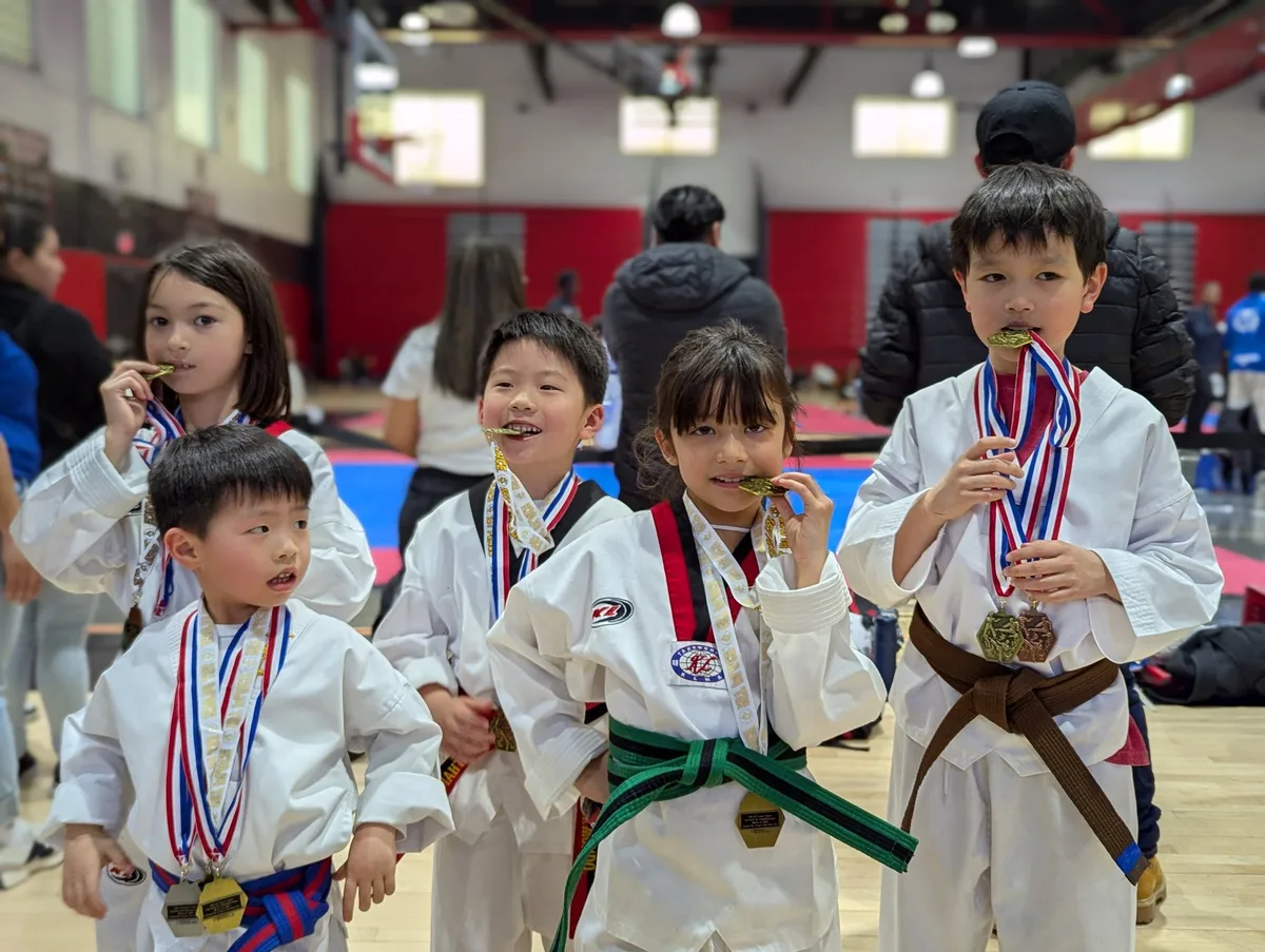 KT Taekwondo students displaying their medals in Ridgewood, New Jersey